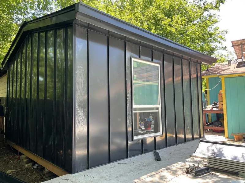 Black standing seam metal wall panels for Metal Roof Installation in Middleton