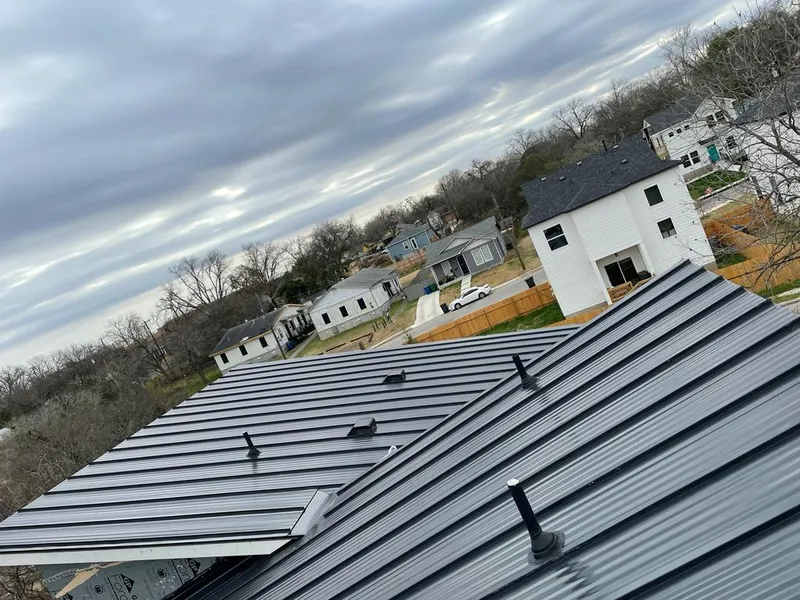 Standing seam metal roof panels with vents for Skylight Repair in Middleton